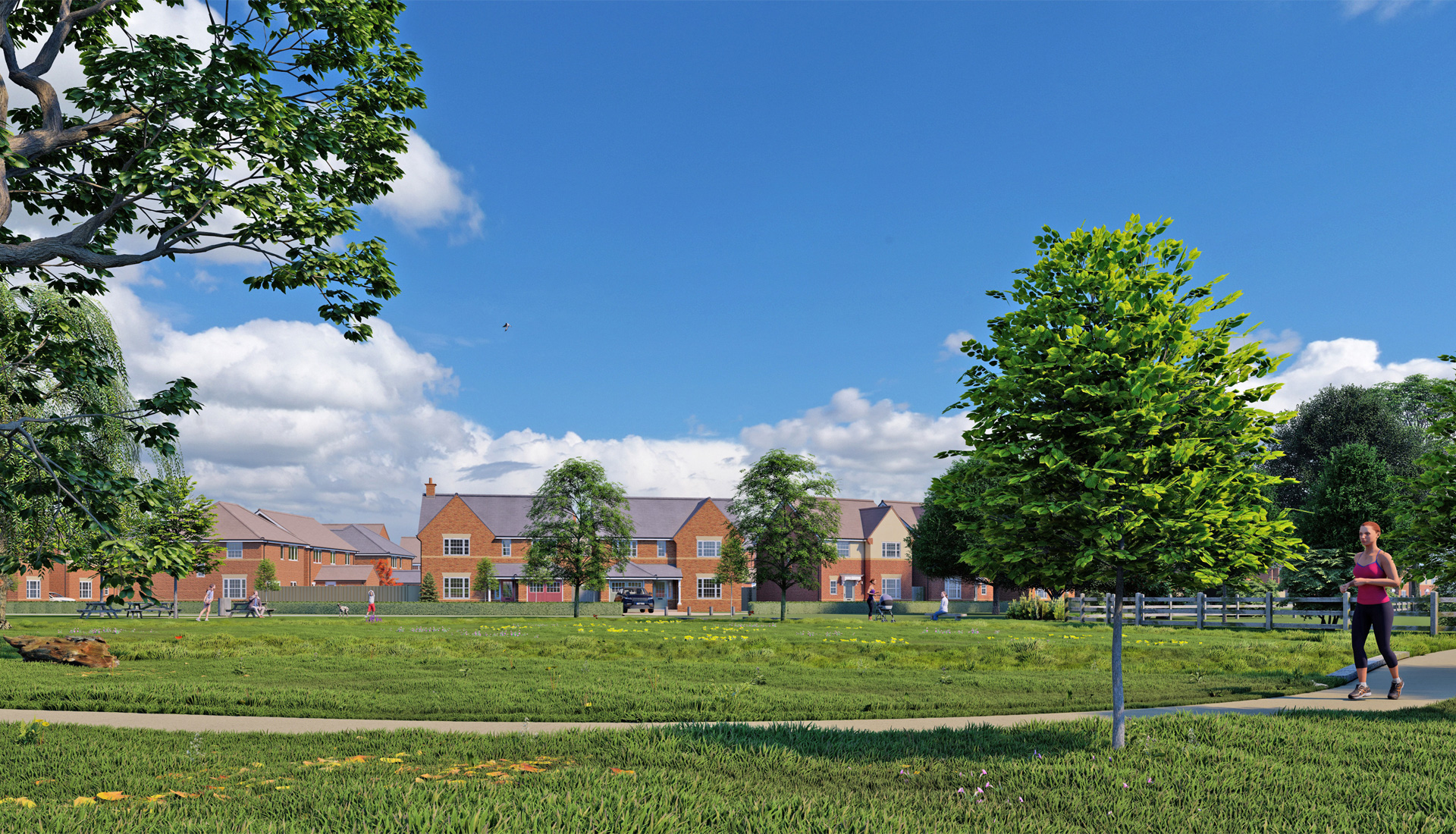A woman running along a gravel path through a park area, near a row of houses.